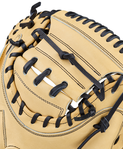 Close-up of a Wilson A2000 1734 34" Baseball Catcher's Mitt (WBW10412934), featuring tan Pro Stock leather with black laces, intricate stitching, and webbing—ideal for catchers seeking premium Wilson performance.