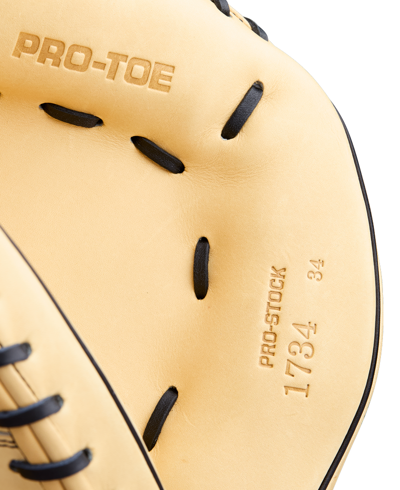 Close-up of a tan Wilson A2000 1734 34" Baseball Catcher's Mitt (WBW10412934) with black laces. "PRO-TOE," "Pro Stock Leather," and "1734 34" are embossed in the leather, showing off the interior and detailed stitching.