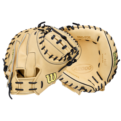 Two tan Wilson A2000 1734 34" Baseball Catcher's Mitts (WBW10412934) with black lacing, made from Pro Stock Leather, are shown—one open and one partially closed—against a plain white background. Brand: Wilson.