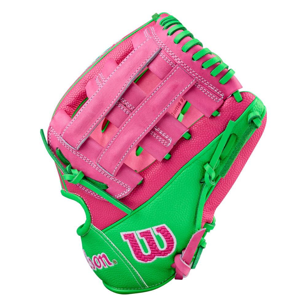 A Wilson A2000 JR11 12" José Ramírez GM Baseball Glove (WBW10413512) in pink and green with white stitching, featuring the Wilson logo in white and pink on the lower part.