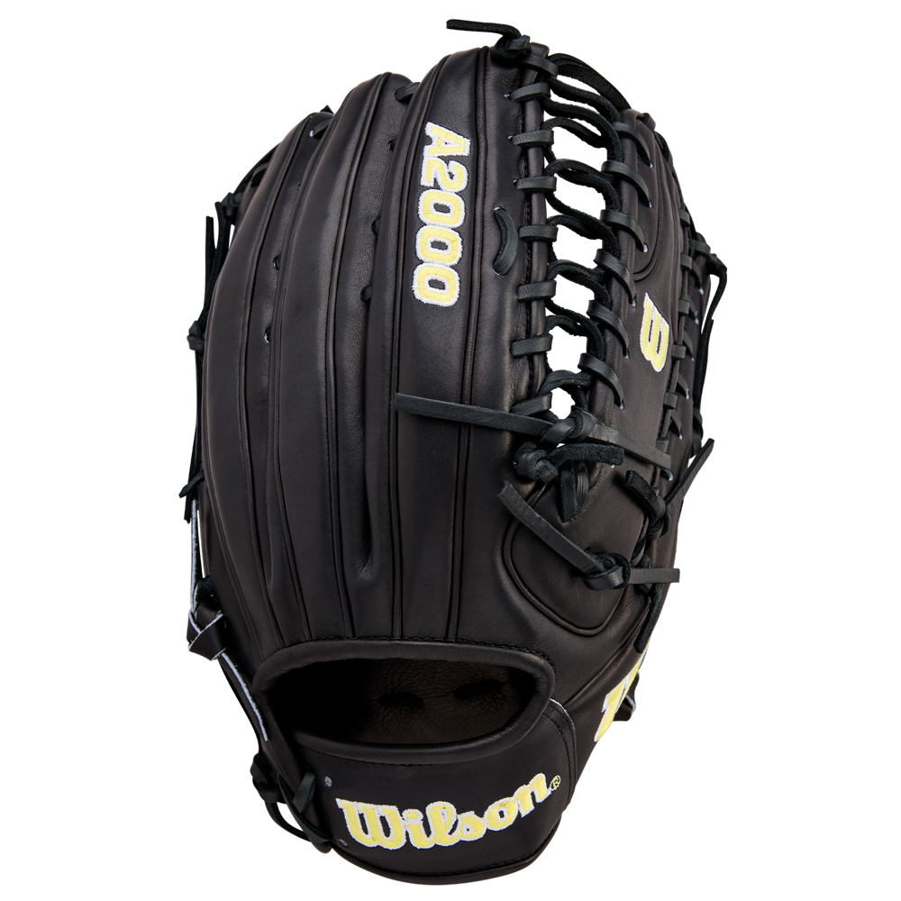 The Wilson A2000 OT7 12.75" Baseball Glove (WBW1041811275) by Wilson is black with tan stitching and logos, made from Pro Stock Leather, and displayed open on a plain white background to show its webbing, laces, and embroidered brand name.