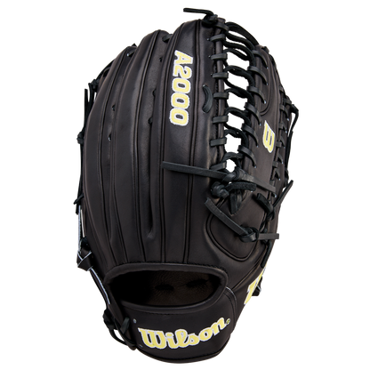 The Wilson A2000 OT7 12.75" Baseball Glove (WBW1041811275) by Wilson is black with tan stitching and logos, made from Pro Stock Leather, and displayed open on a plain white background to show its webbing, laces, and embroidered brand name.