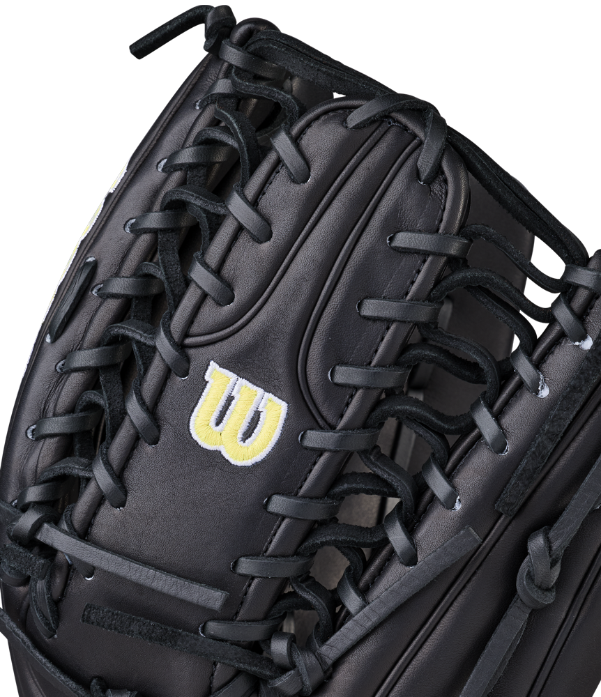 Close-up of the Wilson A2000 OT7 12.75" baseball glove (WBW1041811275), crafted from Pro Stock Leather with black laces and a yellow W logo.