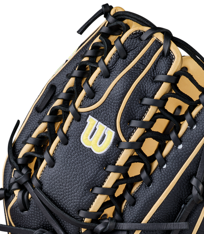 Close-up of the Wilson A2000 OT7SS 12.75" Baseball Glove (WBW1041831275), featuring black and tan textured leather, detailed stitching, black laces, and Wilson’s yellow and white embroidered W logo.