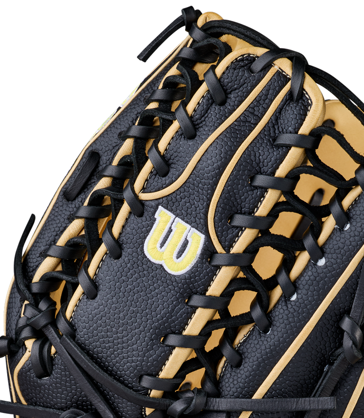 Close-up of the Wilson A2000 OT7SS 12.75" Baseball Glove (WBW1041831275), featuring black and tan textured leather, detailed stitching, black laces, and Wilson’s yellow and white embroidered W logo.