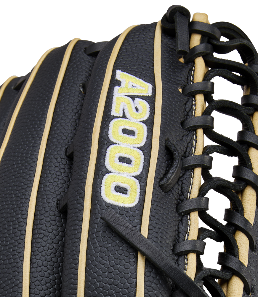 Close-up of a Wilson A2000 OT7SS 12.75" baseball glove (model WBW1041831275) in black with tan laces, featuring "A2000" embroidered in white and yellow on the leather.