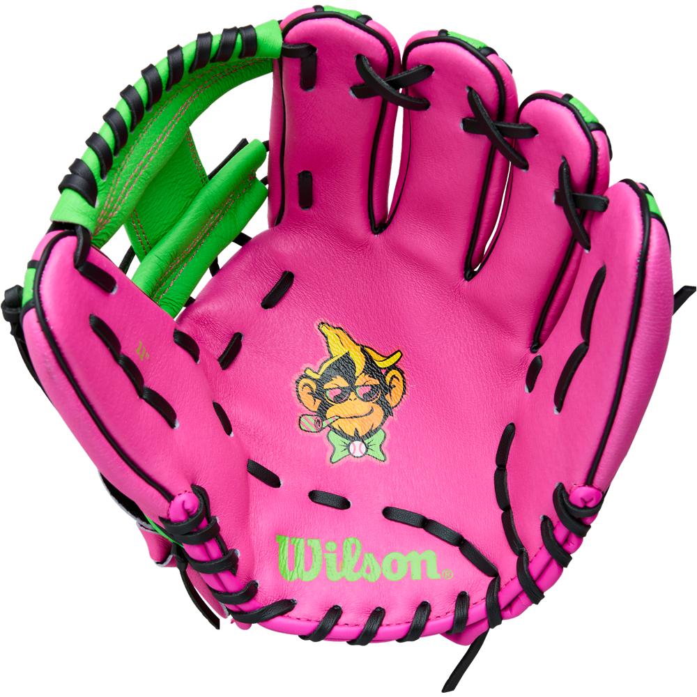 The Wilson A450 Party Animals 11″ Youth Baseball Glove: WBW10419411 features a bright pink H-Web design with black laces, green accents, and a cartoon monkey wearing a bow tie printed on the palm. This playful 11” youth glove is part of Wilson’s Party Animals youth baseball glove collection.
