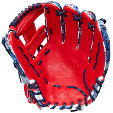 The Wilson A2000 1975SS 11.75" Baseball Glove (GOTM July 2025, WBW1042171175) features a red design with dark blue and white laces, blue and white accents, Pro Stock leather, and the A2000 logo embossed on the palm.