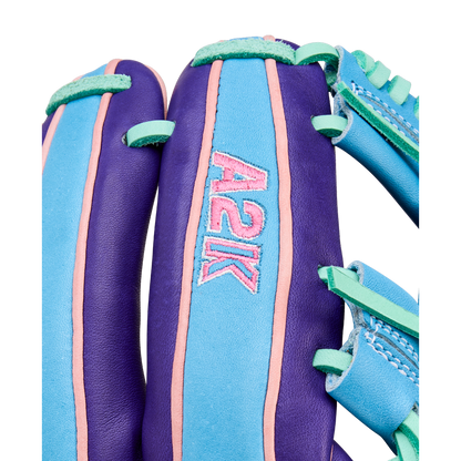A close-up of the Wilson A2K 1720 11.5" Baseball Glove - GOTM October 2025 shows vibrant purple, teal, and pink accents with "A2K" stitched in pink, crafted from premium Pro Stock Select leather for elevated performance.