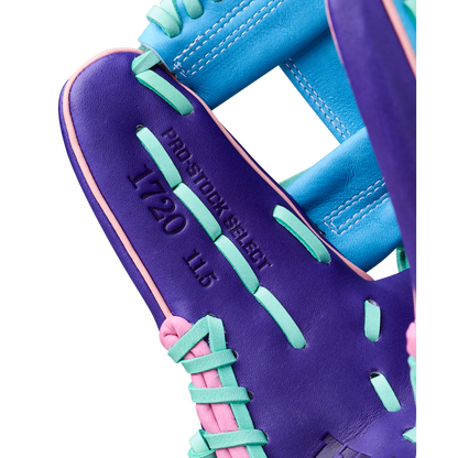 Close-up of a Wilson A2K 1720 11.5" GOTM October 2025 Baseball Glove, featuring purple with teal, blue, and pink laces. Crafted from Pro Stock Select leather, it's stamped PRO STOCK SELECT, 1720, and 11.5 on the palm.