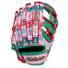 The Wilson A2000 1975 11.75" Baseball Glove (GOTM December 2025) features a festive red, green, and white holiday sweater pattern with bright “A2000” and “Wilson” stitching.