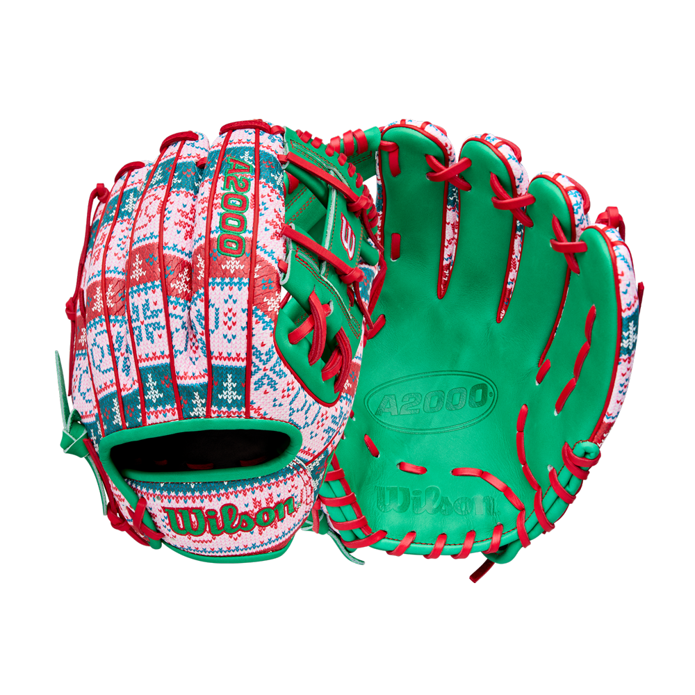The Wilson A2000 1975 11.75" Baseball Glove (GOTM December 2025: WBW1042211175) features a festive holiday sweater design with red, green, and white patterns, green palms, and red laces.