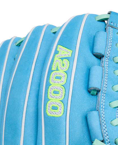 Close-up of a Wilson A2000 FPHG 12" Fastpitch Glove (WBW10423512) in light blue leather with white piping, mint green and yellow A2000 embroidery, plus blue lace detailing.