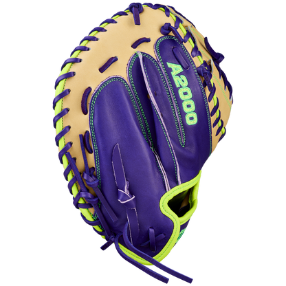The Wilson A2000 FPCM23 34" Fastpitch Catcher's Mitt (WBW10423934) features Pro Stock leather, tan and bold purple sections, neon green lacing and accents, and "A2000" stitched in green on the palm.