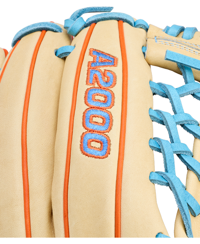 Close-up of a tan Wilson A2000 PF89 11.5" baseball glove with blue laces, orange stitching, and "A2000" embroidered in blue with an orange outline on the back. Brand: Wilson. Model: WBW104602115.