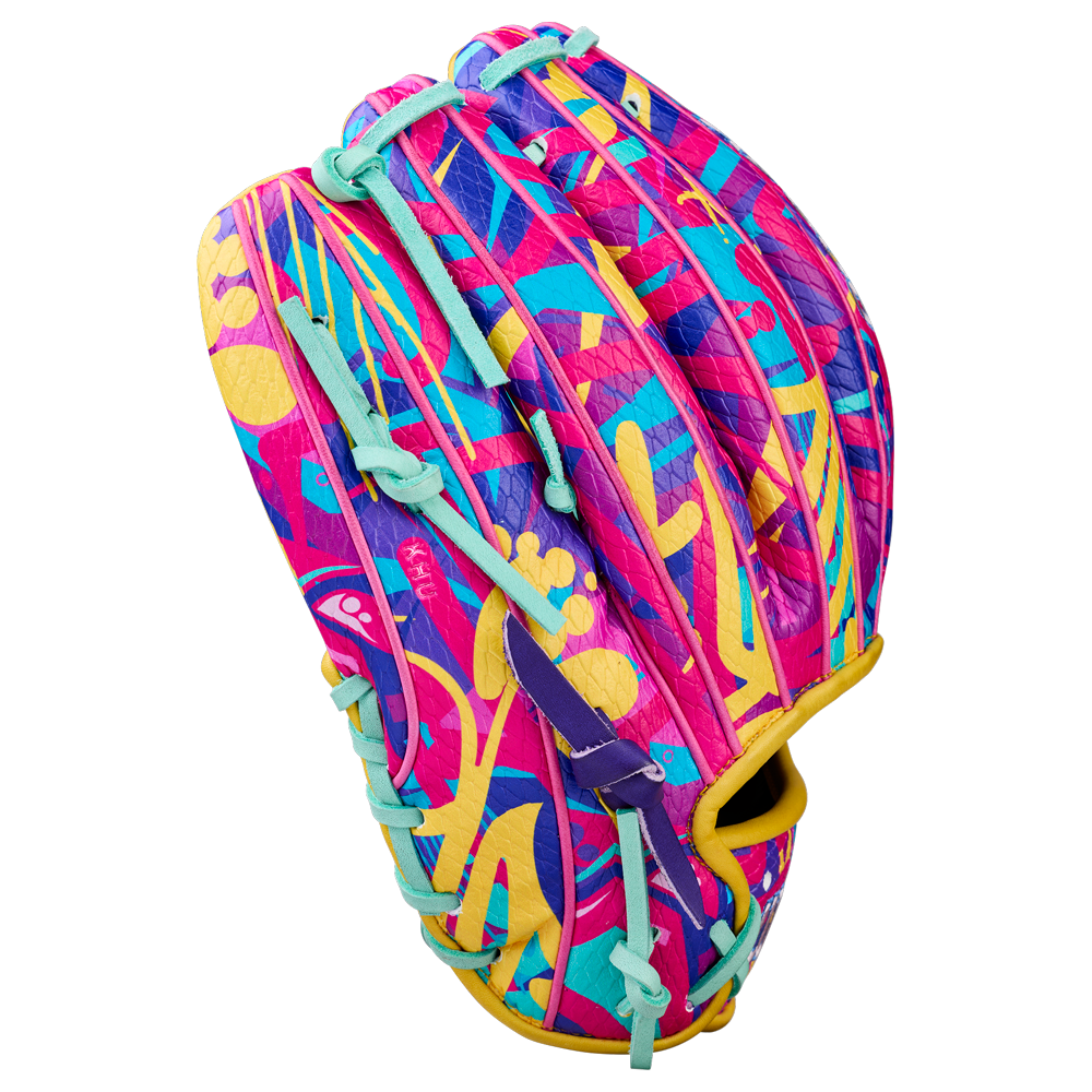 The Wilson A2000 1786SS 11.5" Baseball Glove - GOTM January 2026 features a vibrant abstract design in pink, yellow, turquoise, and purple with Pro Stock leather, turquoise laces, and a yellow wrist trim.