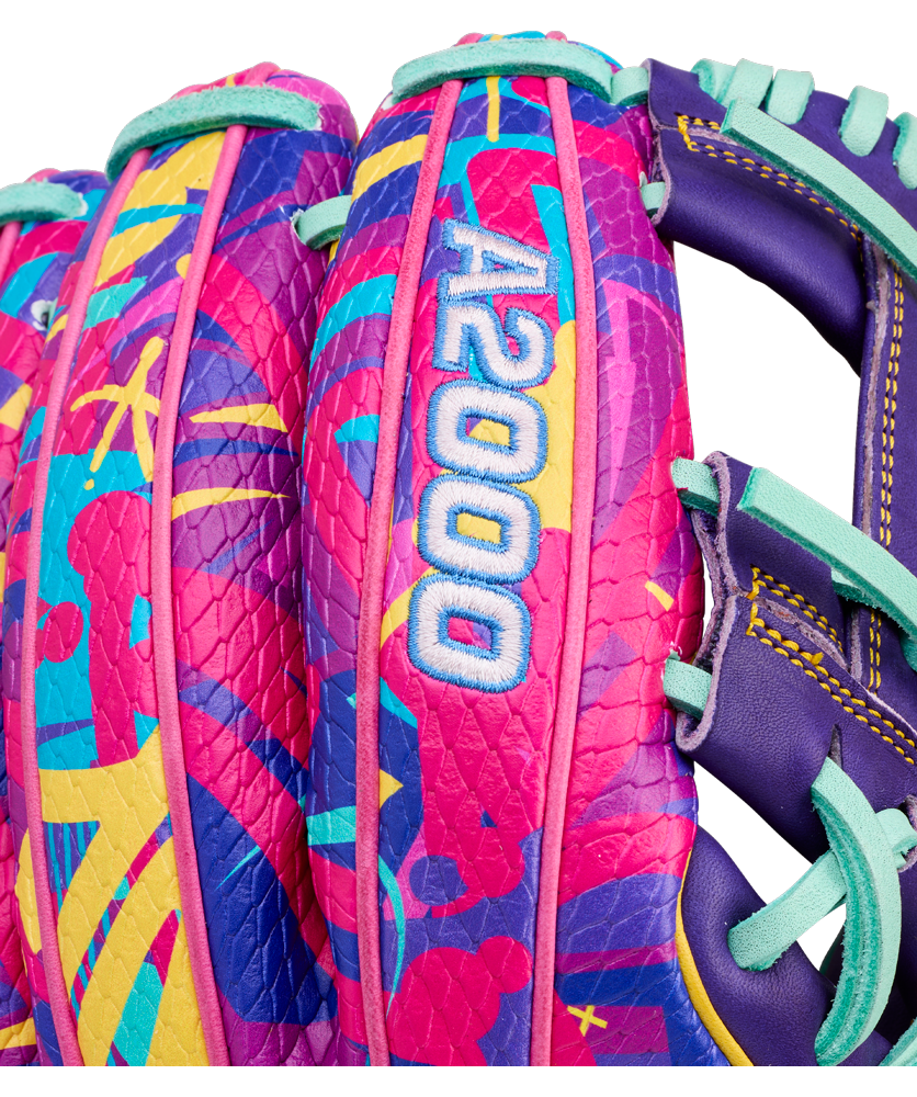 Close-up of the Wilson A2000 1786SS 11.5" Baseball Glove (GOTM January 2026) featuring a vibrant abstract pattern in pink, purple, teal, and yellow with stitched A2000 text on Pro Stock leather.