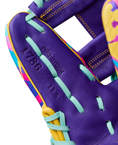 Close-up of the Wilson A2000 1786SS 11.5" Baseball Glove (GOTM Jan 2026), featuring teal laces, yellow accents, and colorful patterns. Made from premium Pro Stock leather, with "1786" and "11.5" embossed on the palm area.
