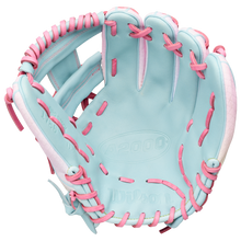 The Wilson A2000 1786SS 11.5" GOTM April 2026 glove features Columbia Blue Pro Stock leather with pink laces and accents, plus the Wilson A2000 logo embossed inside the palm. Model: WBW104645115.