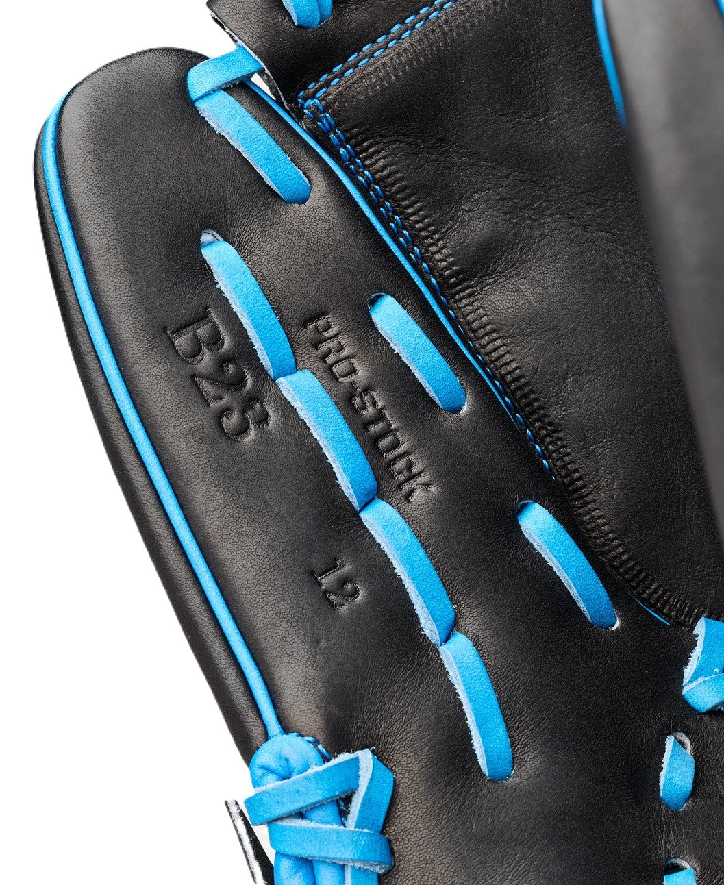 Close-up of the Wilson Love the Moment A2000 B23 12" Baseball Glove: WBW10482912 by Wilson, featuring black Pro Stock Leather with blue laces and B2S5, pro stock, and 12 embossed on its surface.