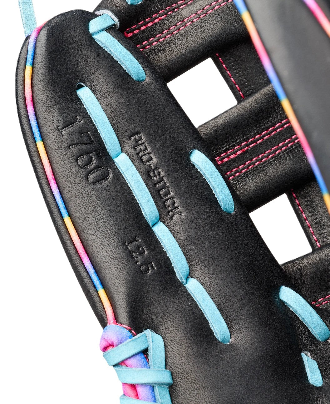 Close-up of a black Wilson Love the Moment A2000 1750 12.5" Baseball Glove (WBW104831125) with blue laces, colorful trim, and pink finger stitching; features embossed text PRO-STOCK 1750 12.5.