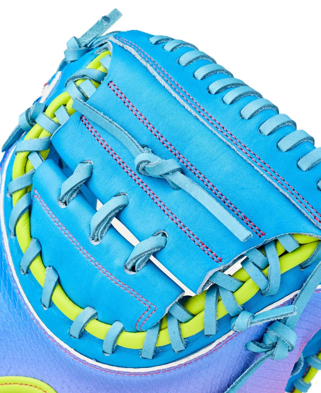Close-up of the Wilson Love the Moment A2000 CM33SS 33" Catcher's Mitt, showcasing vivid blue, green, and purple Pro Stock Leather with pink stitching and detailed lacing.