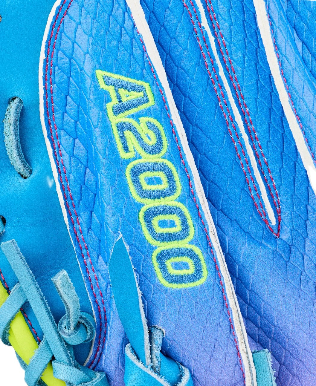 Close-up of the Wilson Love the Moment A2000 CM33SS 33" Catcher's Mitt (WBW10483533) with yellow embroidery, pink stitching, teal laces, and crafted from premium Pro Stock Leather.