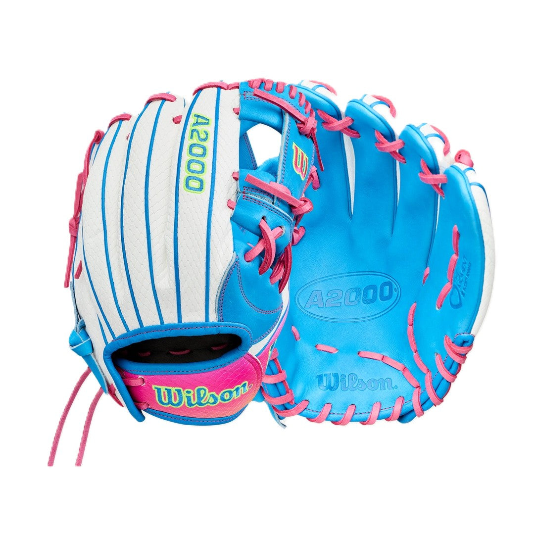 A pair of Wilson Love the Moment A2000 H12SS 12" Fastpitch Gloves in blue, white, pink, yellow, and green with “Wilson” logo on the wrist strap—shown palm and back. Ideal for fans supporting Autism Speaks.