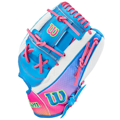 The Wilson Love the Moment A2000 H12SS 12" Fastpitch Glove features bright blue, pink, purple, and white sections with pink laces and neon yellow-green “W” logos on the wrist and thumb.