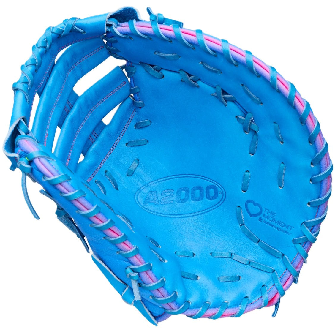 The Wilson Love the Moment A2000 1612 12" First Base Mitt (WBW10483812) features blue Pro Stock Leather with pink and purple lacing, plus “A2000” and “Moment 4 Moment” on the palm, inspired by the Autism Speaks glove initiative.