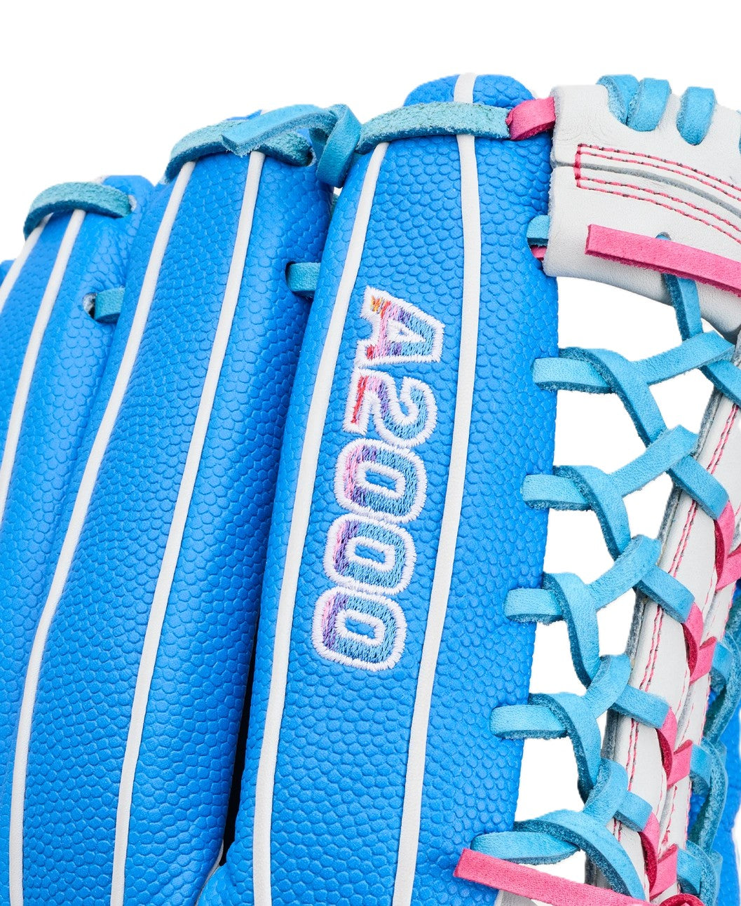 Close-up of the Wilson Love the Moment A2000 T125SS 12.5" Fastpitch Glove featuring bright blue leather, white and pink stitching, blue lacing, and "A2000" embroidered in pink and white on the back.