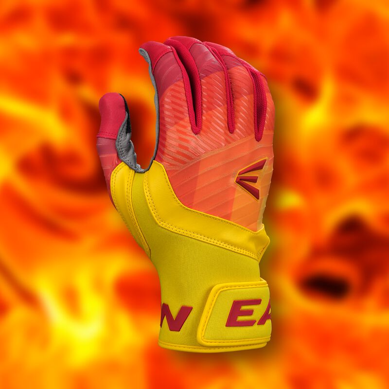 A bright yellow and red goalkeeper glove with the word EASTON partially visible, shown upright against a vivid, fiery orange flame background.