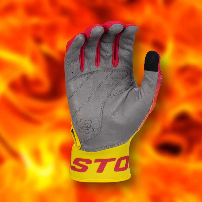 A gray work glove with red and yellow accents is shown palm-up against a background of orange and yellow flames.