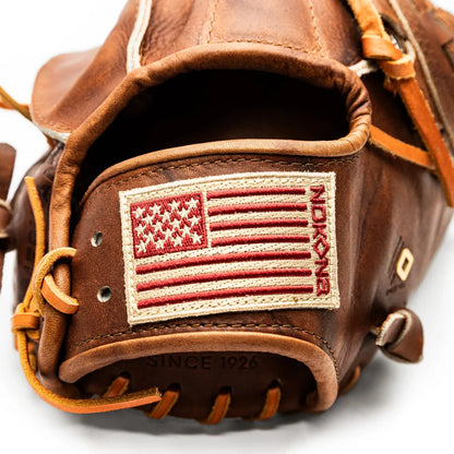 Handcrafted from Walnut Crunch leather, this brown Nokona Walnut EP 12″ Baseball Glove: W-EP1200 features an American flag patch and the brand name embroidered vertically along its side.