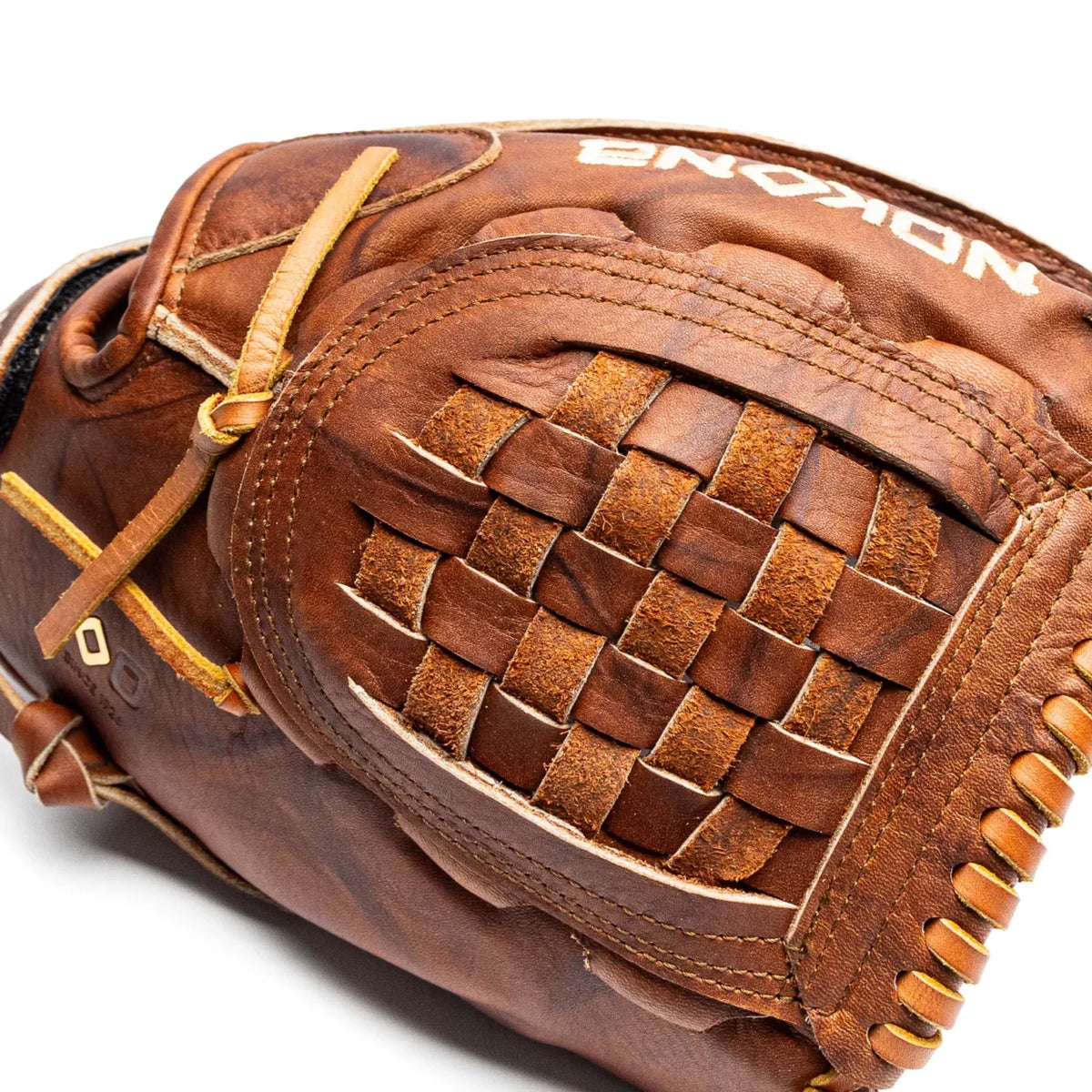 Nokona Walnut EP 12″ Fastpitch Glove: W-EP-V1200 handcrafted from brown Walnut Crunch™ leather, featuring a woven web and laced pocket.