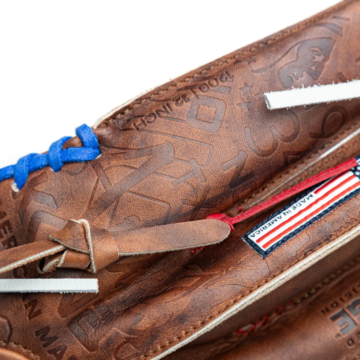 Close-up of a brown Walnut Crunch Nokona Walnut EP 12″ Baseball Glove: W-EP1200POP featuring a pattern of embossed logos, blue lacing at the wrist, and a Made in America flag patch.