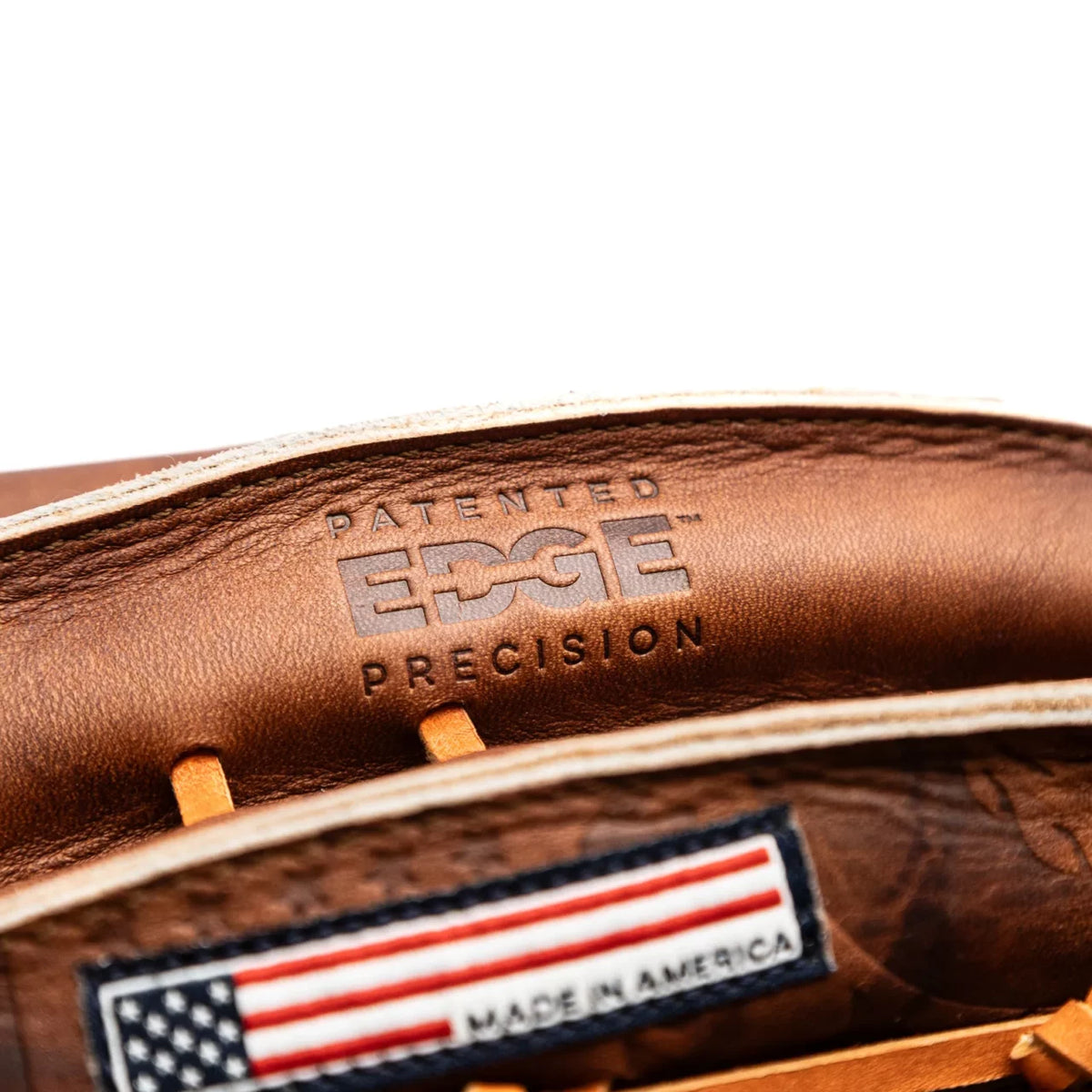 Close-up of the interior of a Nokona Walnut EP 13″ Baseball Glove: W-EP1300C, showing Patented Edge Precision branding and a Made in America tag with an American flag.
