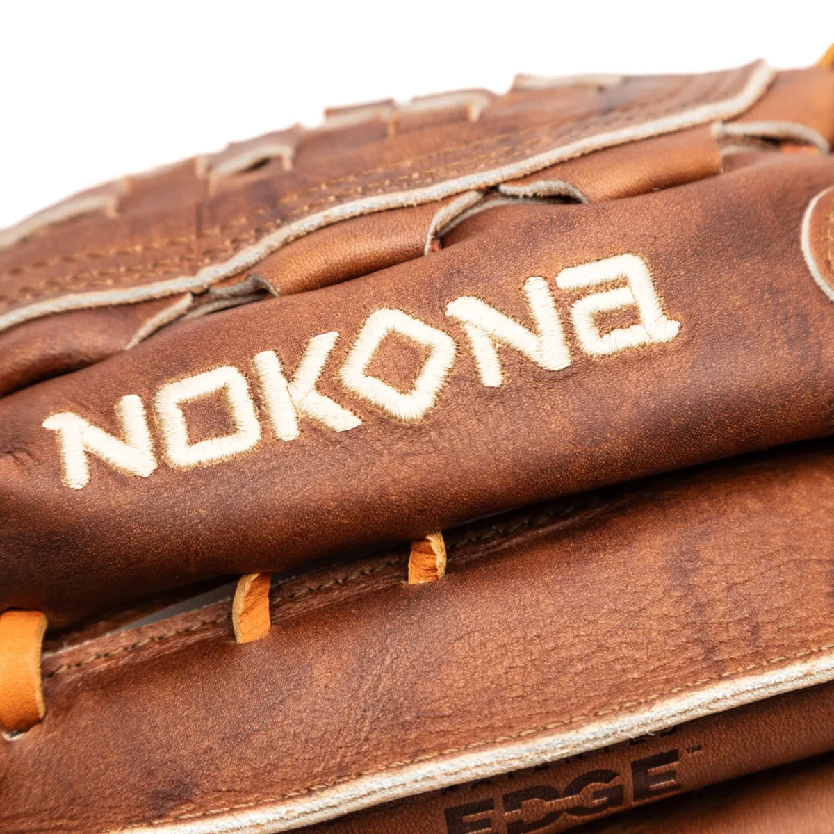 Brown leather Nokona Walnut EP 13″ Baseball Glove: W-EP1300C with the brand name embroidered in white thread.