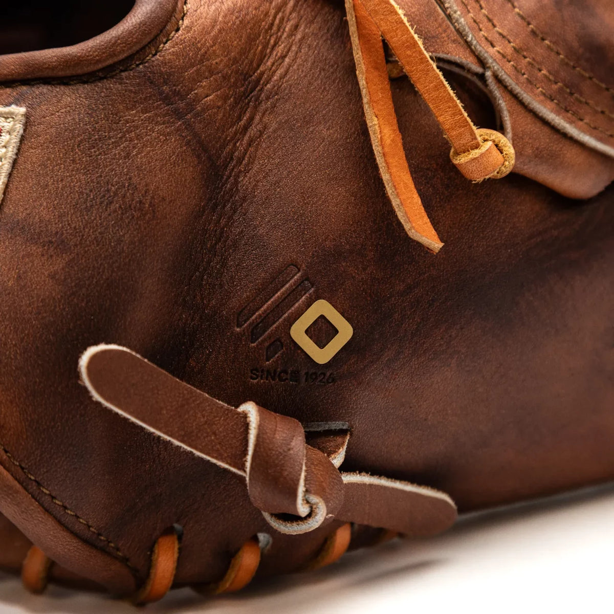 Close-up of a Nokona Walnut EP 13″ Baseball Glove: W-EP1300C, featuring a logo with the text SINCE 1926.