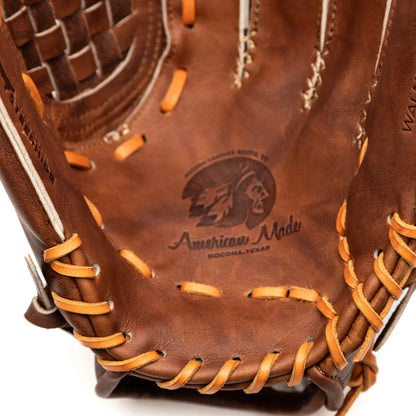 Nokona Walnut EP 13″ Baseball Glove: W-EP1300C in Walnut Crunch leather with tan lacing and an embossed palm logo featuring a profile of a person and the text American Made, Nocona, Texas.
