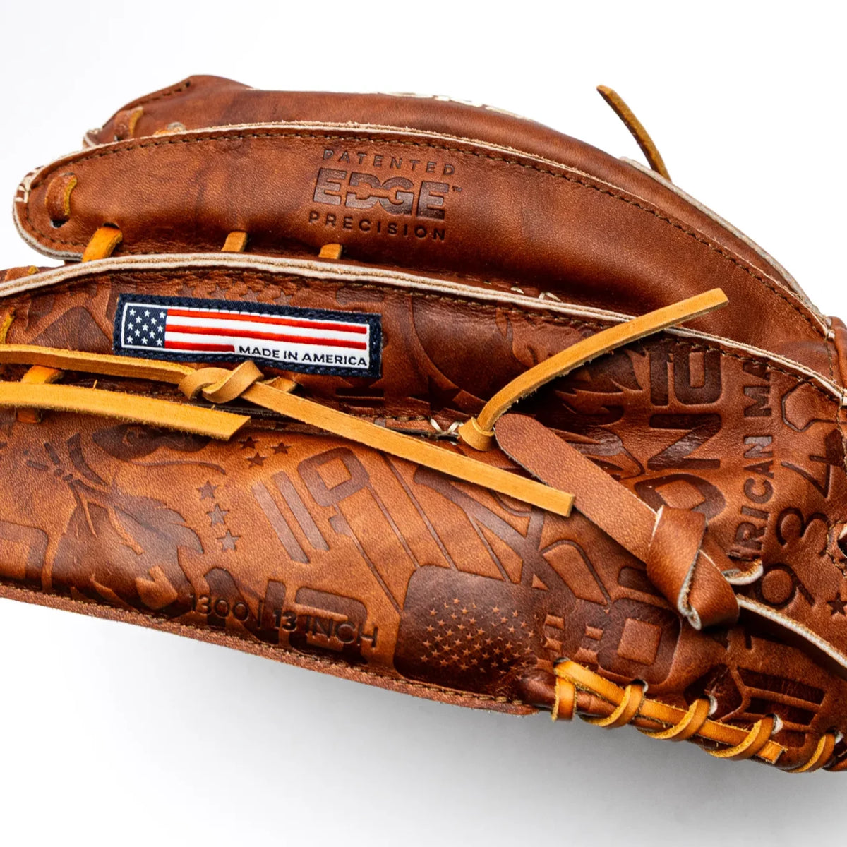 Brown leather Nokona Walnut EP 13″ Fastpitch Glove: W-EP-V1300 with an American flag patch and Made in America text, featuring embossed patterns and lacing on the 13″ closed web design.