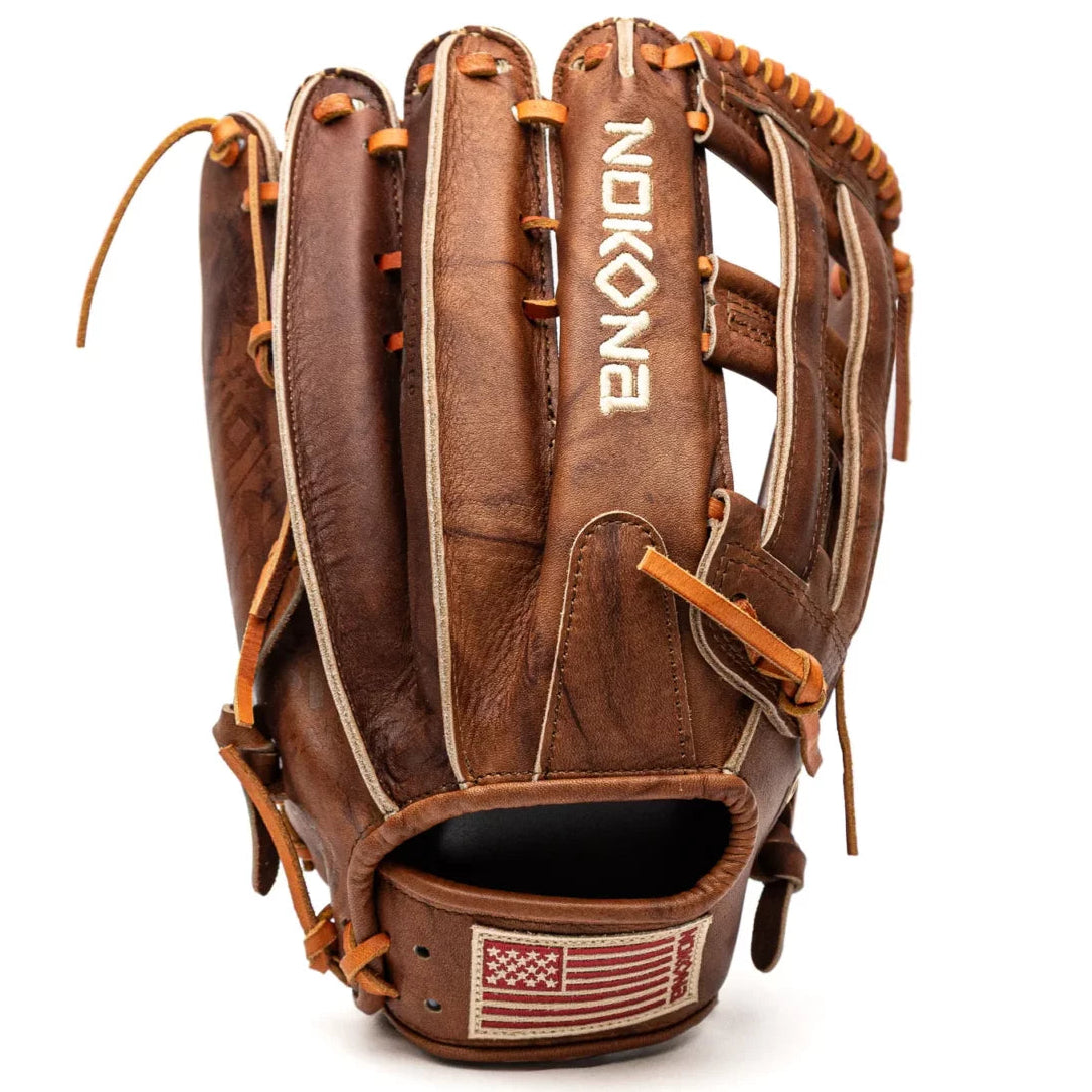 Brown Nokona Walnut EP 13″ Baseball Glove: W-EP1300H in leather with tan lacing and an American flag patch on the wrist strap.