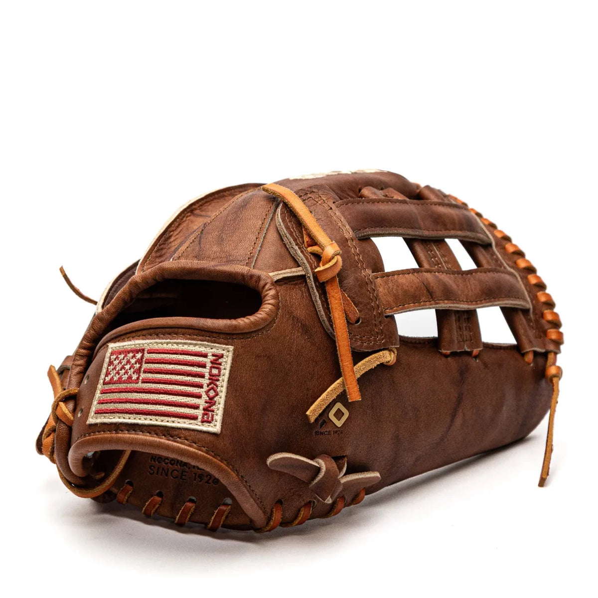 Brown leather Nokona Walnut EP 13″ Baseball Glove: W-EP1300H outfield glove with a patch featuring an American flag on the wrist strap.