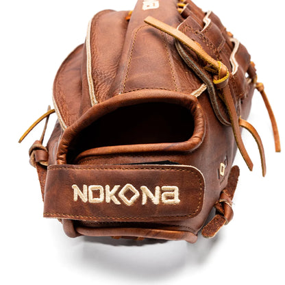 Back view of a 13″ H Web Nokona Walnut EP 13″ Fastpitch Glove (W-EP-V1300H) in Walnut Crunch leather, featuring an adjustable wrist strap with embroidered lettering.