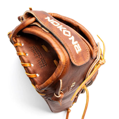 Top-down view of a brown leather Nokona Walnut EP 13″ Fastpitch Glove: W-EP-V1300H with white embroidery and lace detailing.