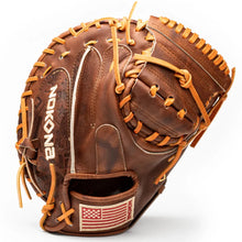 Brown leather Nokona Walnut EP 33.5″ Baseball Catcher’s Mitt: W-EP3350 with tan lacing and an American flag patch on the wrist strap.