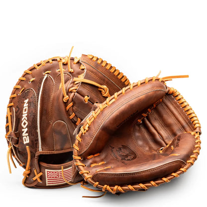 Two brown leather Nokona Walnut EP 33.5″ Baseball Catcher’s Mitt: W-EP3350s with tan lacing, one shown from the side and the other from the palm, featuring an American flag patch on the wrist strap.