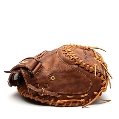 A brown Nokona Walnut EP 32.5″ Fastpitch Catcher’s Mitt: W-EPV3250 with tan rawhide lacing.