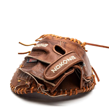 Nokona Walnut EP 32.5″ Fastpitch Catcher’s Mitt: W-EPV3250 in Brown Walnut Crunch leather featuring lace-up web details, Precision Edge construction, and branding on the wrist strap.
