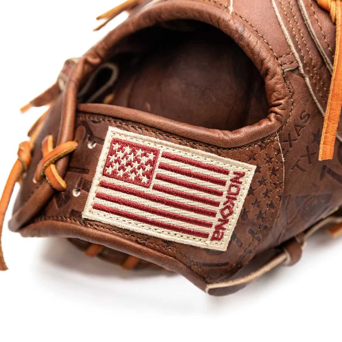 Nokona Walnut EP 13″ First Base Mitt: W-EPN70 in Brown Walnut Crunch leather featuring an embroidered American flag patch on the wrist strap.